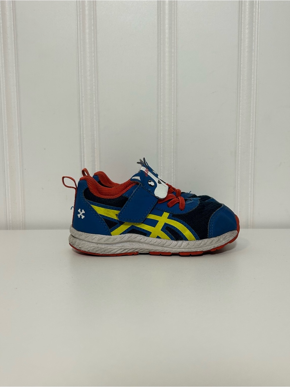ASICS blue red yellow puppy strap toddler